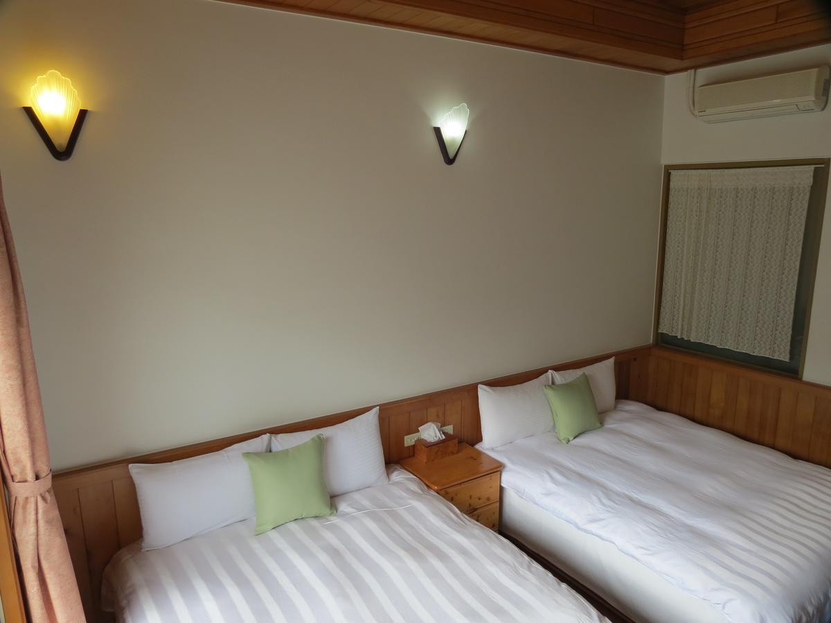 Seasons Inn Джиаоси Екстериор снимка